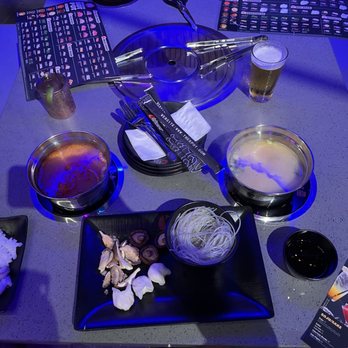 KPOT Korean BBQ & Hot Pot - Our table with 2 hot pots - Korean Near Me - Ballwin, Missouri