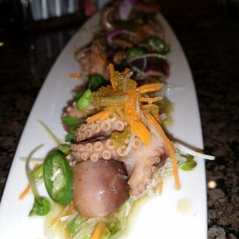 Sushi Jin - marinated octopus salad tossed with fish sauce dressing, daikon redish, kaiware redlish, carrots & serano pepper - Sushi Bars Near Me - Houston, Texas