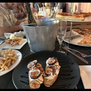 The UxLocale - Crostini (special) poutine fries (special) pizza and Prosecco - Italian Near Me - Uxbridge, Massachusetts The UxLocale - Crostini (special) poutine fries (special) pizza and Prosecco - Italian Near Me - Uxbridge, Massachusetts