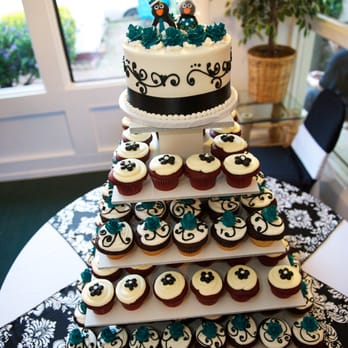 Mazzetti's Bakery - June 9th, 2012 wedding cupcake cake from Mazzetti's Bakery. Red Velvet cupcakes and marble cupcakes with buttercream frosting. - Bakeries Near Me - Pacifica, California Mazzetti's Bakery - June 9th, 2012 wedding cupcake cake from Mazzetti's Bakery. Red Velvet cupcakes and marble cupcakes with buttercream frosting. - Bakeries Near Me - Pacifica, California