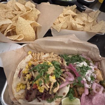 Torchy's Tacos - Republican Taco and Baja Shrimp Taco. Chips and Guacamole and Chips and Queso - Tacos Near Me - Austin, Texas