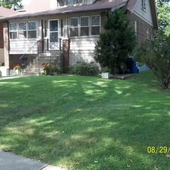 Mid County Lawn Care - a house in the background - Landscaping Near Me - Overland, Missouri Mid County Lawn Care - a house in the background - Landscaping Near Me - Overland, Missouri