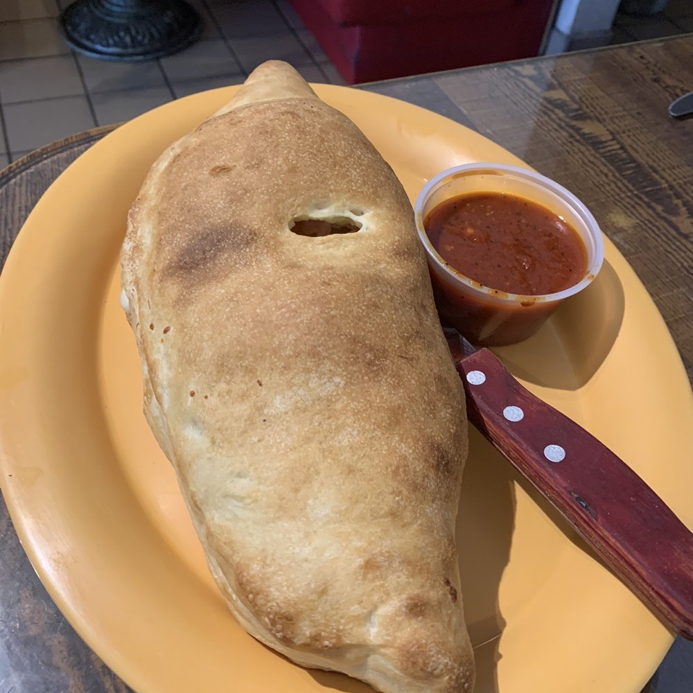 Bella Pizza - Hawaiian calzone - Italian Near Me - Mesquite, Nevada Bella Pizza - Hawaiian calzone - Italian Near Me - Mesquite, Nevada