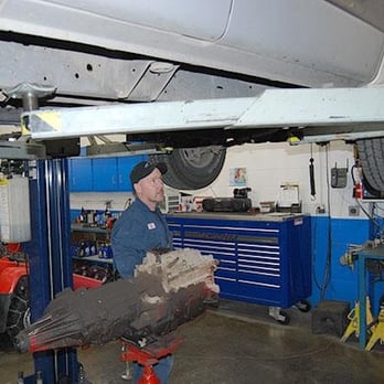 Brandy's Automotive - Tom from Brandy's Automotive working under a clients car. - Auto Repair Near Me - Bend, Oregon