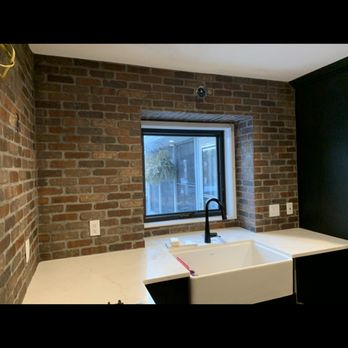 Wall To Wall Tiling - a kitchen with a sink and a window - Flooring Near Me - Farmington, Minnesota Wall To Wall Tiling - a kitchen with a sink and a window - Flooring Near Me - Farmington, Minnesota