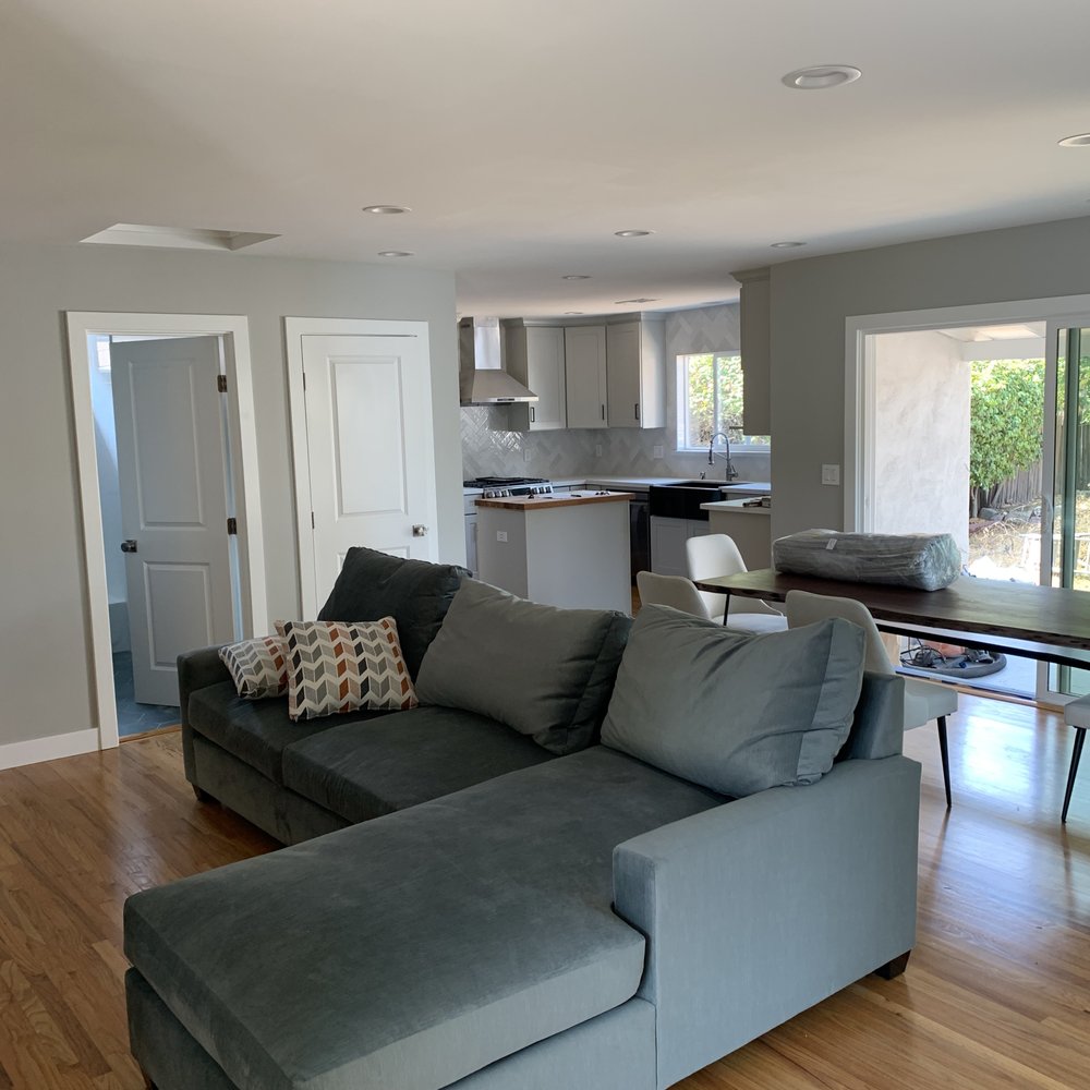 Main living space opening up to the kitchen, with closet and laundry, opening up to backyard with large sliding door. Main living space opening up to the kitchen, with closet and laundry, opening up to backyard with large sliding door.