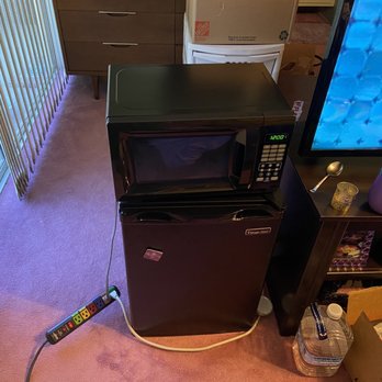Walmart - a microwave and a refrigerator in a living room - Department Stores Near Me - Simi Valley, California