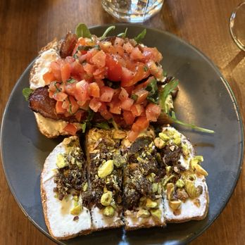 Postino Village District - Bruschetta Board - tomato burrata and ricotta with pistachio - Wine Bars Near Me - Raleigh, North Carolina Postino Village District - Bruschetta Board - tomato burrata and ricotta with pistachio - Wine Bars Near Me - Raleigh, North Carolina
