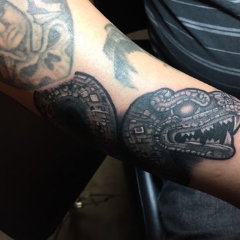 Heatstroke Tattoo - Aztec 2 headed serpent other side - Piercing Near Me - Indio, California