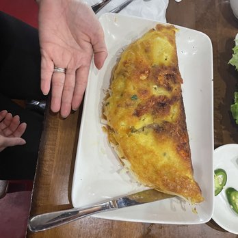 Bep Saigon Asian Kitchen - Hand for size reference - Vietnamese Near Me - Austin, Texas Bep Saigon Asian Kitchen - Hand for size reference - Vietnamese Near Me - Austin, Texas