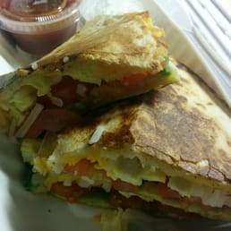 Avocado/Tomato quesadilla with hash browns & eggs