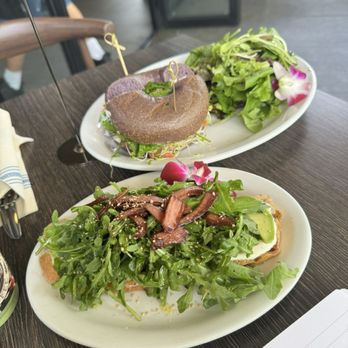 Island Vintage Coffee - Lox bagel on a taro bagel, side of arugula salad, and avocado toast - Coffee & Tea Near Me - Kapolei, Hawaii Island Vintage Coffee - Lox bagel on a taro bagel, side of arugula salad, and avocado toast - Coffee & Tea Near Me - Kapolei, Hawaii