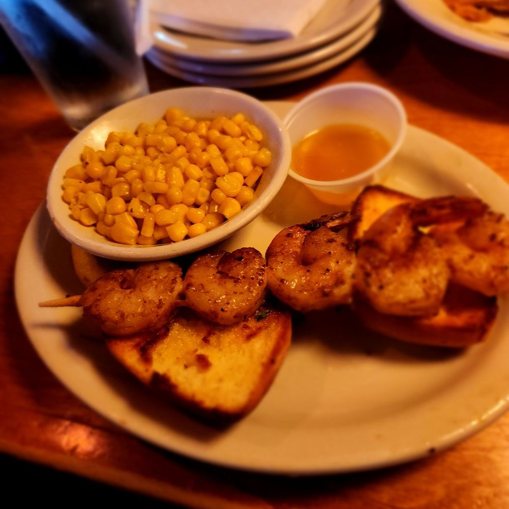 Texas Roadhouse - GRILLED SHRIMP APPETIZER Seasoned shrimp drizzled with garlic lemon pepper butter and served on toasted fresh-baked bread - Steakhouses Near Me - Grove City, Ohio Texas Roadhouse - GRILLED SHRIMP APPETIZER Seasoned shrimp drizzled with garlic lemon pepper butter and served on toasted fresh-baked bread - Steakhouses Near Me - Grove City, Ohio