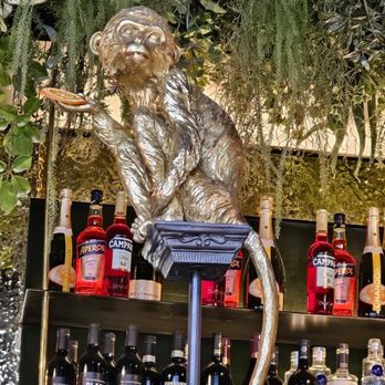 Daintree Pinsa Bar - Monkey at the bar - Pizza Near Me - Munich, BY