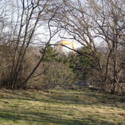 Savin Hill Park - You'll hardly be able to see the gas tank one the trees leaf out