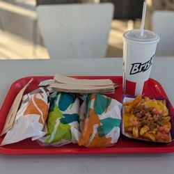 Taco Bell - Deluxe box, with a cantina chicken soft taco, beefy five-layer burrito, chalupa supreme beef, fries supreme, and a drink