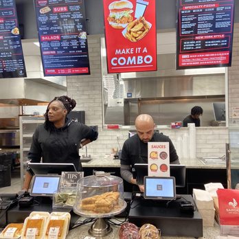 Saroki's Crispy Chicken & Pizza - two men working behind the counter - Chicken Shop Near Me - Canton, Michigan Saroki's Crispy Chicken & Pizza - two men working behind the counter - Chicken Shop Near Me - Canton, Michigan