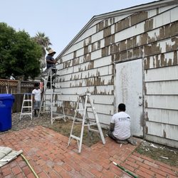 Finish Line Painting Services - Scraping off old stuff