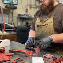Johnson Hardware Rental, Farm & Garden - Our authorized Milwaukee repair technician doing what he does best.