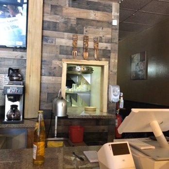 Maya's Cafe - a counter with a pizza oven - Latin American Near Me - San Jose, California