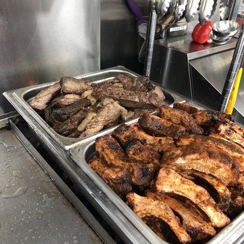 Bad Boys BBQ - a variety of meats being prepared - Barbeque Near Me - Bend, Oregon Bad Boys BBQ - a variety of meats being prepared - Barbeque Near Me - Bend, Oregon