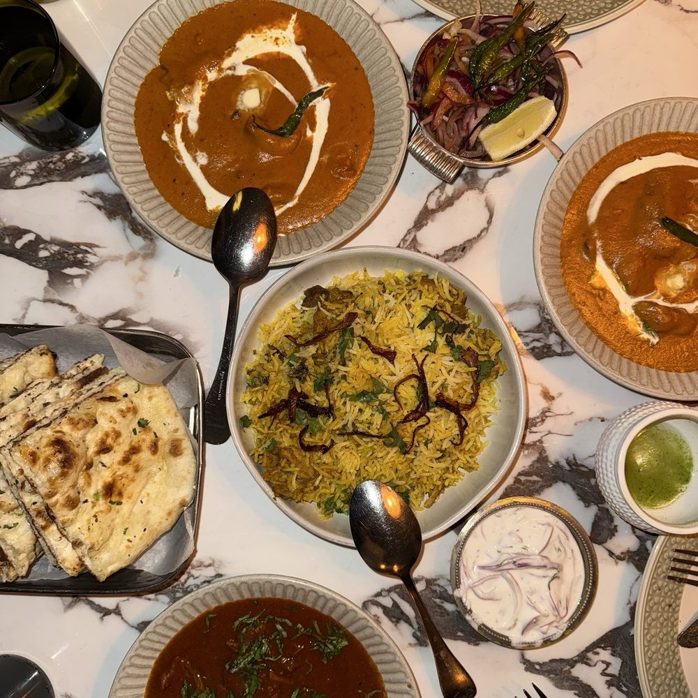 Dilli Dilli - PANDARA ROAD BUTTER CHICKEN, NATIONAL MUTTON CURRY, DEHLA VI CHICKEN BIRYANI, BUTTER GARLIC NAAN - Indian Near Me - New York, New York Dilli Dilli - PANDARA ROAD BUTTER CHICKEN, NATIONAL MUTTON CURRY, DEHLA VI CHICKEN BIRYANI, BUTTER GARLIC NAAN - Indian Near Me - New York, New York