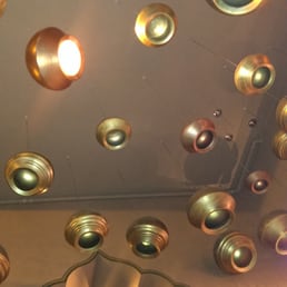 Cool decor inside - gold pots hanging from the ceiling Cool decor inside - gold pots hanging from the ceiling
