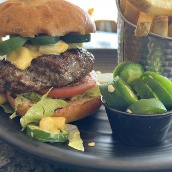 Stormrunners Tavern - A twist on their legendary "No Quarter" burger!! - Tiki Bars Near Me - Gulfport, Florida Stormrunners Tavern - A twist on their legendary "No Quarter" burger!! - Tiki Bars Near Me - Gulfport, Florida
