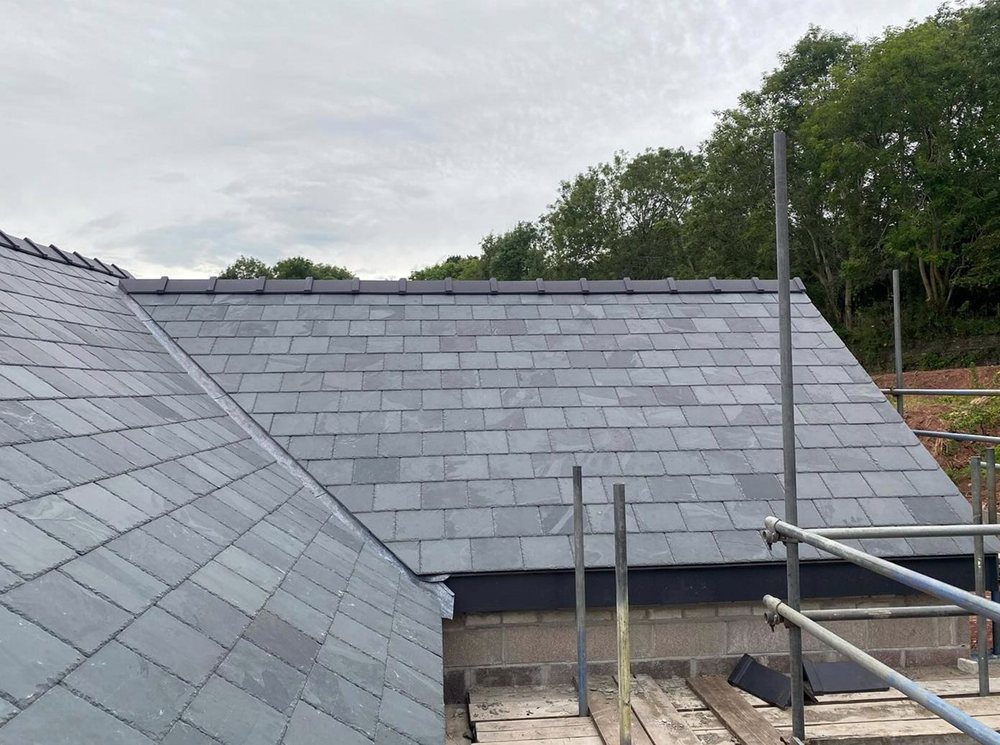 Slide of North Shattuck Roofing