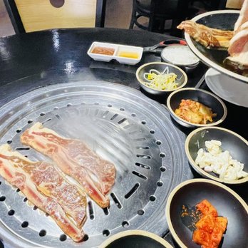 YOON Korean BBQ - a variety of foods on a grill - Korean Near Me - Carrollton, Texas