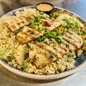 California Fish Grill - Mahi Mahi plate with rice and corns - Seafood Near Me - Brea, California California Fish Grill - Mahi Mahi plate with rice and corns - Seafood Near Me - Brea, California