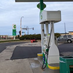 Eagan BP - Gas pump with sign in the background