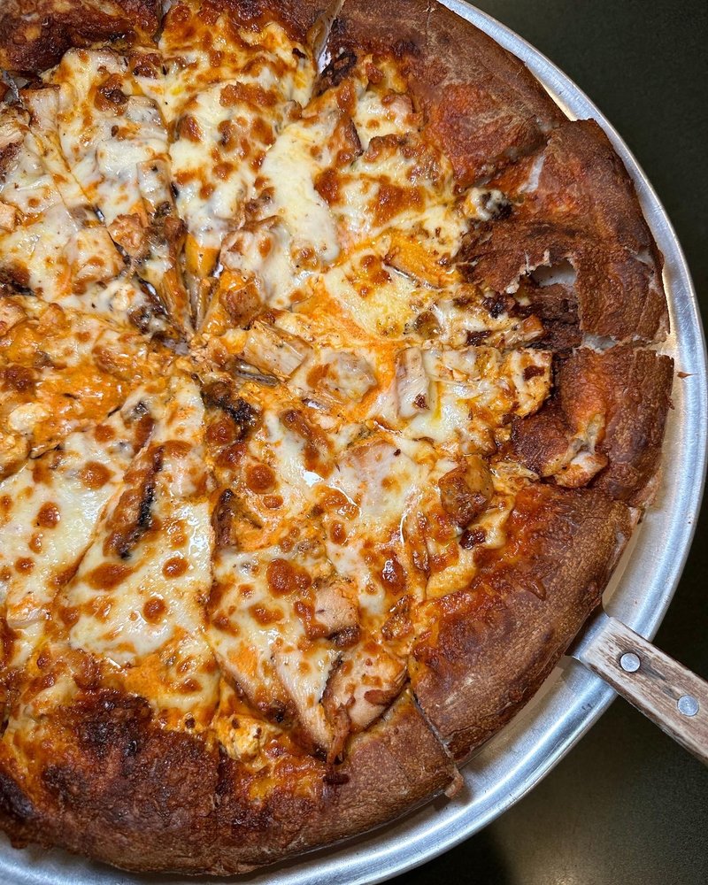 Tommy's Pizza Palace Logo
