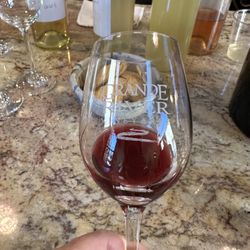 Grande River Vineyards - Looking at the color of a red wine sample.
