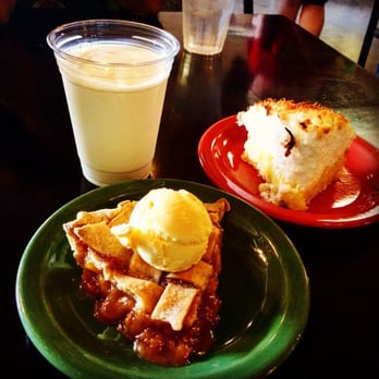 Pie Peddlers - 2 slices of Heaven- fresh, homemade peach pie a la mode w/ a tall glass of whole milk and a piece of coconut cream meringue pie. - Desserts Near Me - Glen Rose, Texas
