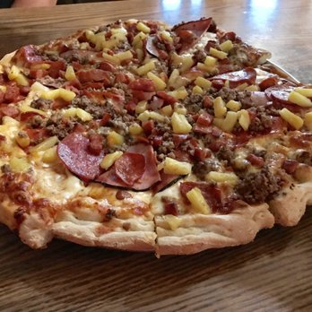 Eagle's Nest Pizza - The all meat pizza with BBQ sauce instead of tomato sauce and pineapple. Seven kinds of meat! - Pizza Near Me - Cottonwood, California Eagle's Nest Pizza - The all meat pizza with BBQ sauce instead of tomato sauce and pineapple. Seven kinds of meat! - Pizza Near Me - Cottonwood, California