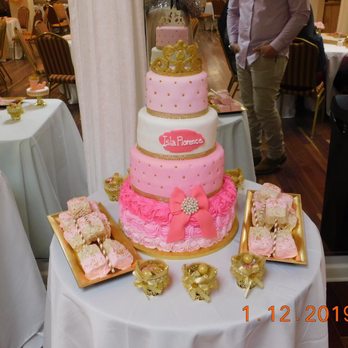 Sweet Cherry Bakery - 4-tier cake with dipped Rice Krispie treats - Bakeries Near Me Sweet Cherry Bakery - 4-tier cake with dipped Rice Krispie treats - Bakeries Near Me