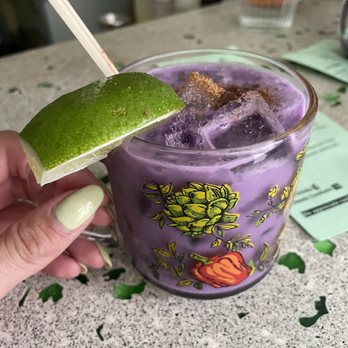 Shaka Shaka Tiki - a purple drink with a lime wedge - Tiki Bars Near Me - Brooklyn, New York