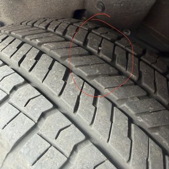 Goodyear Auto Service - Tire with nail in the middle - Tires Near Me - Baltimore, Maryland