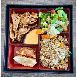 Siam Thai Cuisine - Hibachi pork, fried rice, fried dumplings, and fresh stir fried veggies.