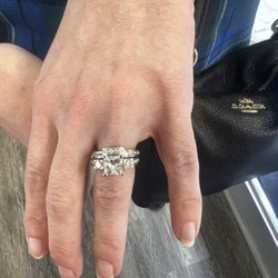 Howard's Fine Jewelry - Custom wedding band added to ring. The match was perfect!
