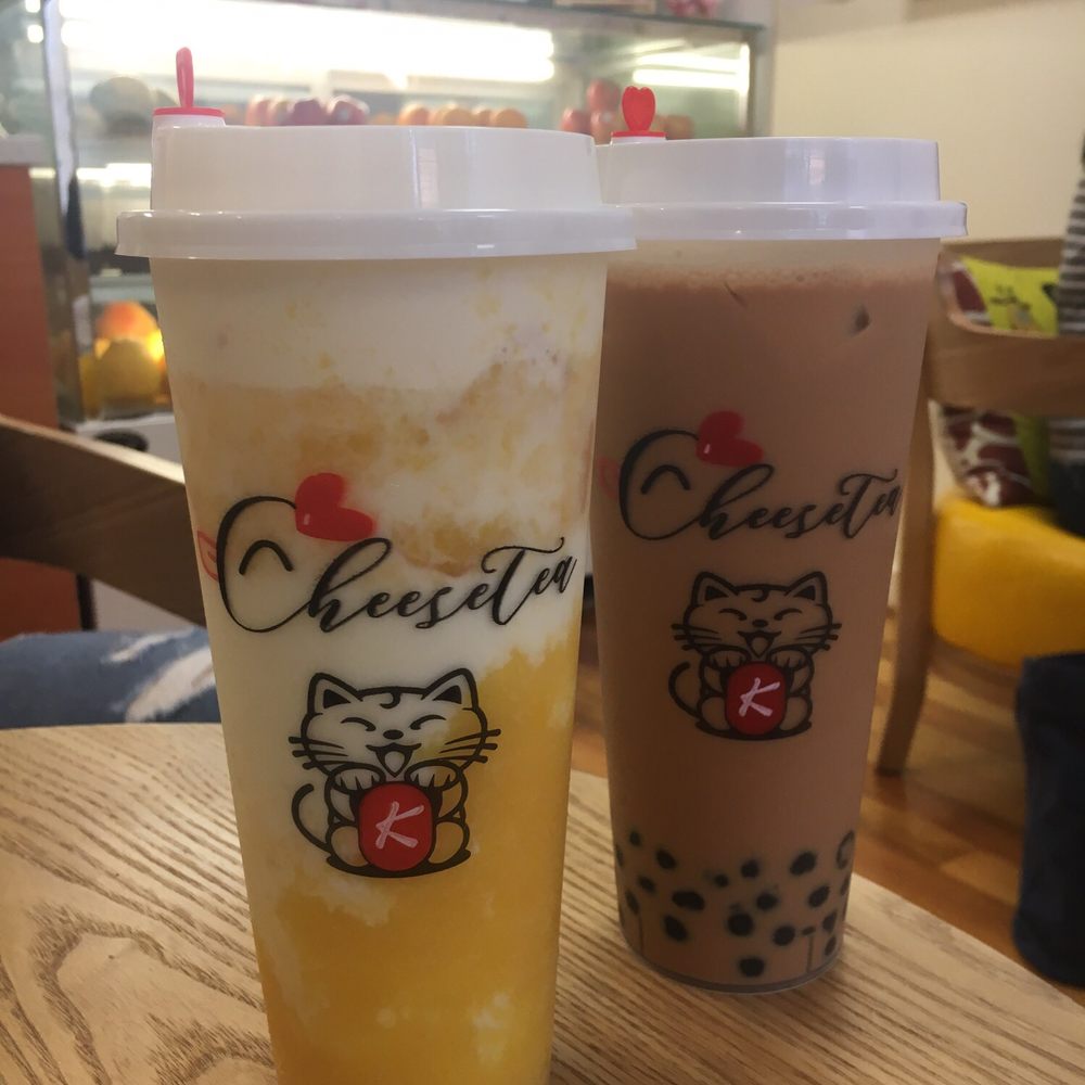 Drincup Cafe - Left: Large Messy Peach ($7.25, seasonal) Right: Large Bubble Milk Tea ($5.25) - Bubble Tea Near Me - Honolulu, Hawaii Drincup Cafe - Left: Large Messy Peach ($7.25, seasonal) Right: Large Bubble Milk Tea ($5.25) - Bubble Tea Near Me - Honolulu, Hawaii