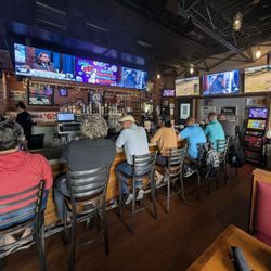 The sports bar side of things, taken from one of the dining booths on my side of the aisle.