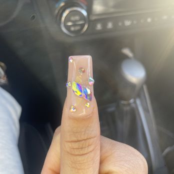 AJ Nails Spa - He CLUMPED random rhinestones together. Thumb nail super shorter than the rest of my nails - Nail Salons Near Me - Vacaville, California