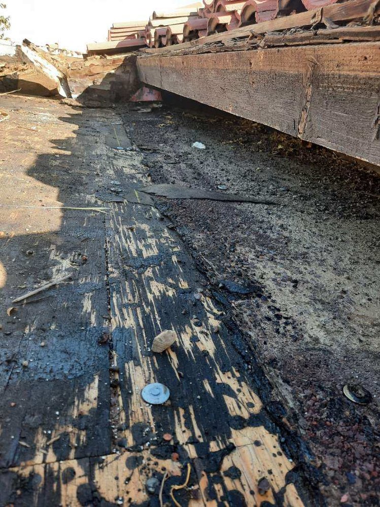 Slide of Contreras Roofing