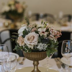 I Do Florals - Centerpiece in vases we were able to purchase instead of rent - gave them away to guests who loved them.