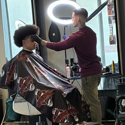 A Cut Above - Cam taking care of my son