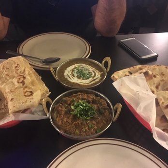 Punjab Indian - On the left are plain pranthas and on the right are plain naans. Both were extremely fresh and hot. - Indian Near Me - Corning, California