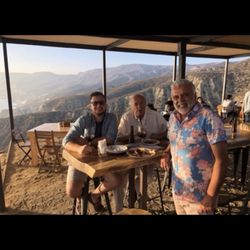 Michel's Limousines - Valle de Guadalupe; Cuatro Cuatros: Client's enjoying the 1st stop of the wine tasting tour, and enjoying the picturesque views.