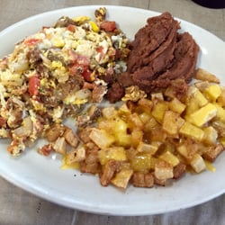 AJ'S Cafe - Chicharron and egg plate w bean and potatoes.....(pork skins & egg)